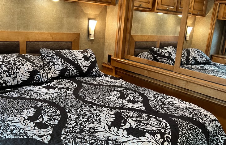 Queen bed with full-length closet