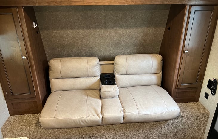 Jack knife sofa also has two cup holders