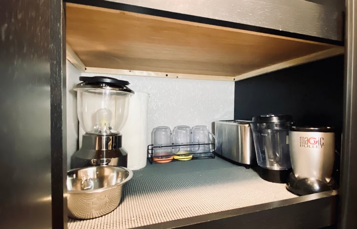 Pantry with magic bullet blender, toaster, cups for smoothies, a complimentary lantern for your picnic table, and of course, let's not forget a food bowl for your furry friend!!