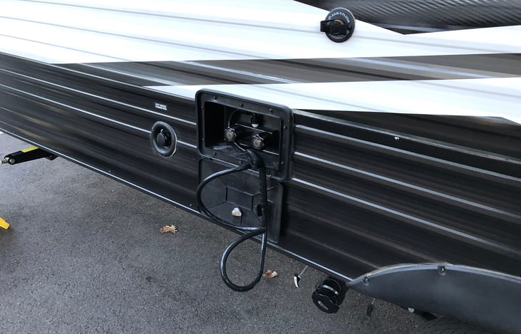 Driver Side (Outdoor Shower, and All RV Connections)