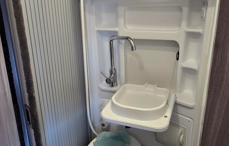 Bathroom sink down position.