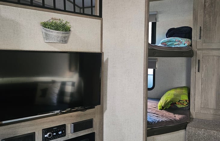 Loft-style top bunk bed and lower bunk bed