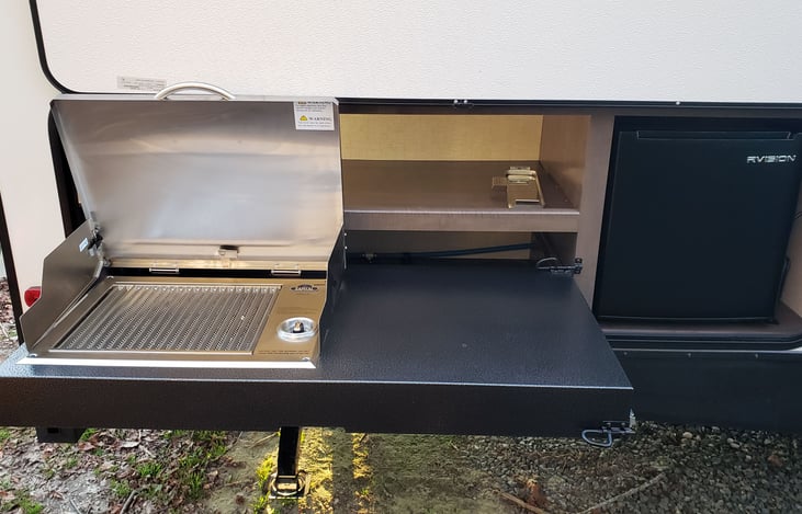 Outdoor kitchen / blackstone grill provided for cooking