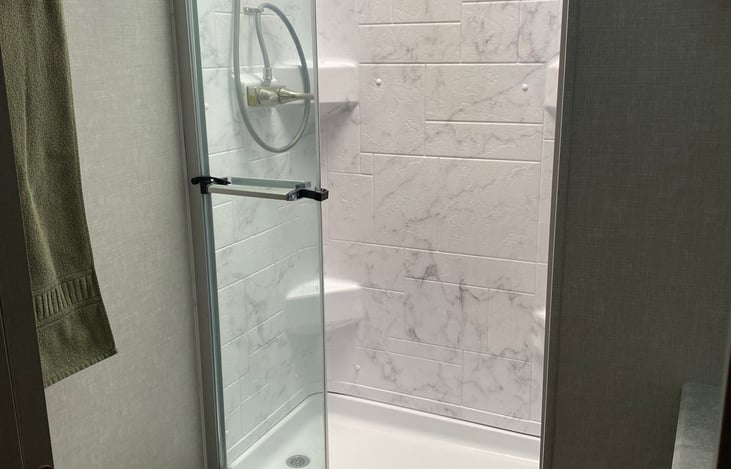 Full bathroom with spacious shower!