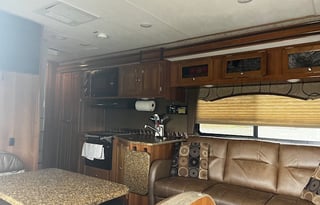 Max Mileage, Off Grid Solar, sleeps 8, 2 slides;