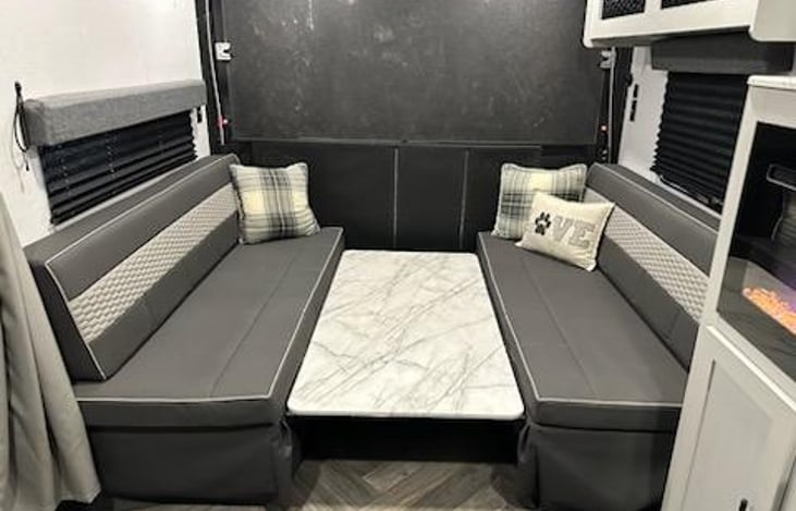 Living Area / Second Sleeping Area - table folded down to make into a bed(s).