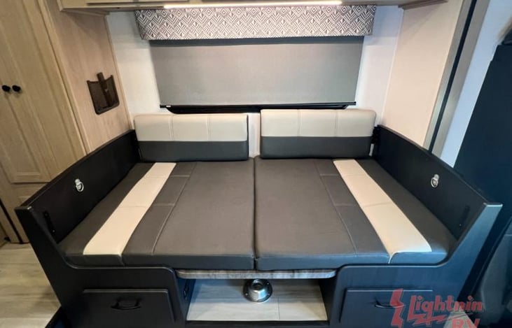 Dinette converted to a bed and also has two child seat thethers.