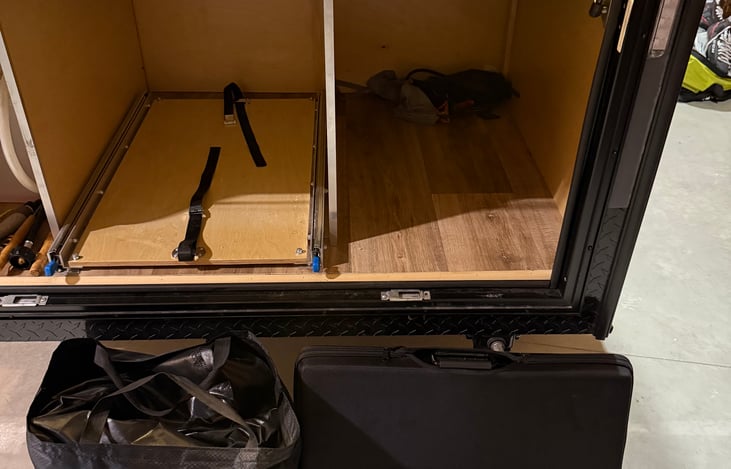 Storage area for Portable renogy solar panel & roam 8x8 enclosed awning room enclosure.