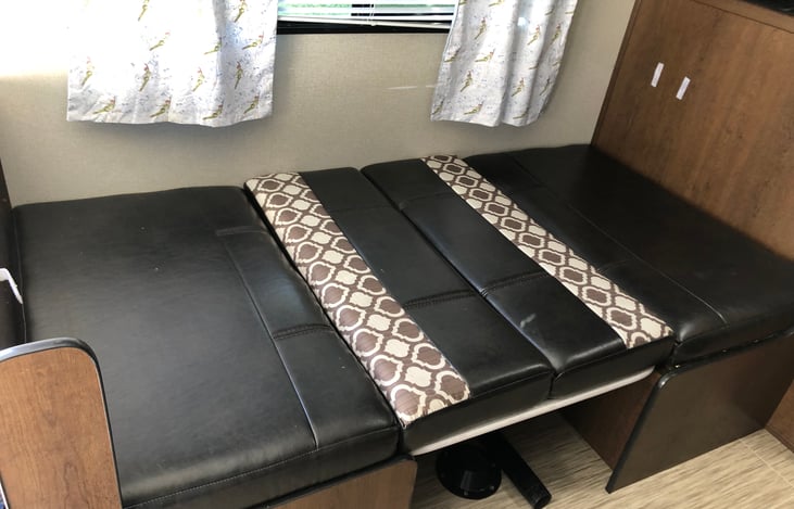 Dinning space converted flat, ready for use. Lounge with bean bags, watch a show or bedtime.