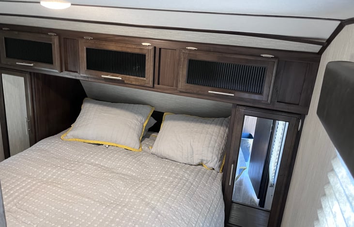 Master bedroom with queen size bed.