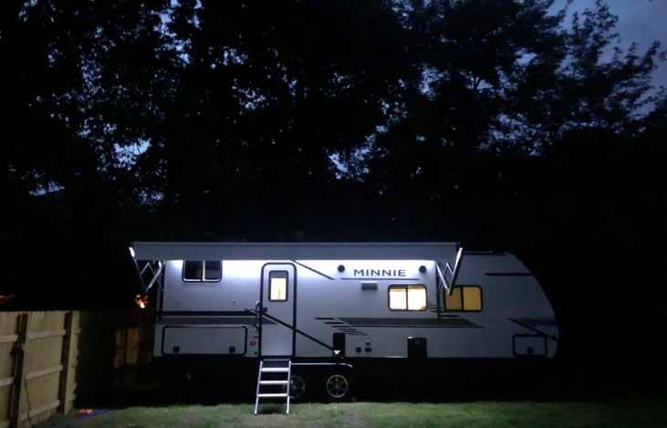 Large powered awning with led lights, & outdoor speakers/ sound system.