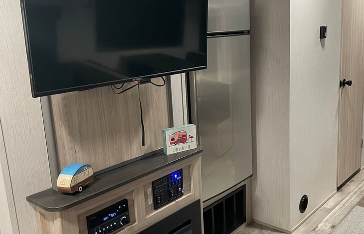 Enjoy an electric fire while watching tv.