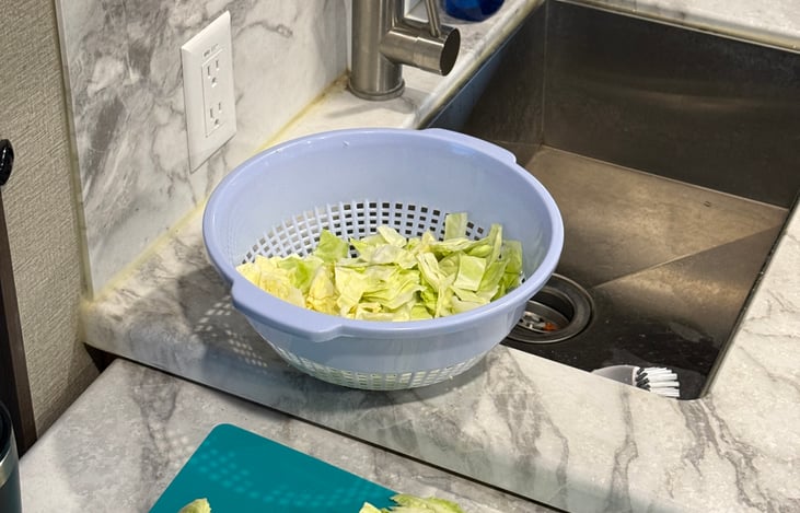 Plenty of counter space to prepare food. The trailer is equipped with pots and pans, cutting board, strainer, serving utensils, mixing bowls and more.