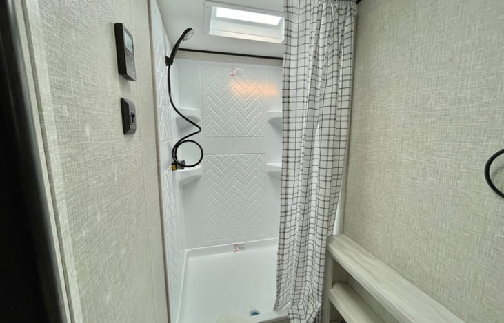 bathroom with shower and toilet.
