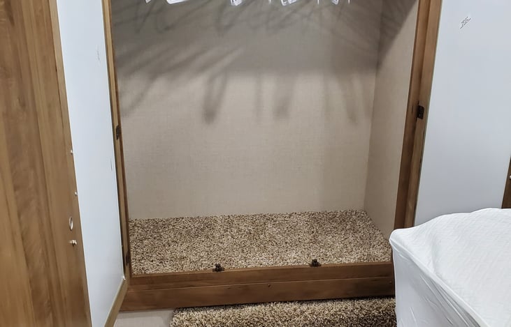 Small closet with hangers