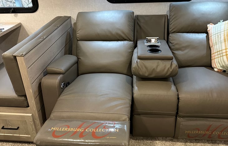 This can be either a full couch or can be used as a dual recliner with cup holder in the middle, this is also the sleeping option for person #5.