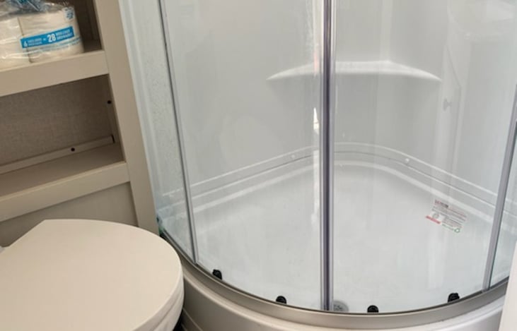 Porcelain toilet, big shower