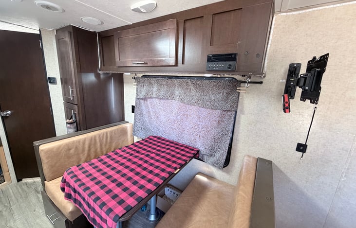 Dinette converts to a bed as well.