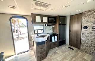 Fully furnished travel trailer for a small family.