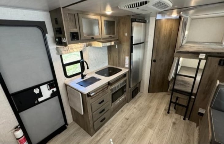 Ample Space to wrangle up a good meal for all in the fully-equipped kitchen including a Full-Size frig/freezer.