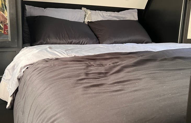 Private bedroom with fresh bedding.