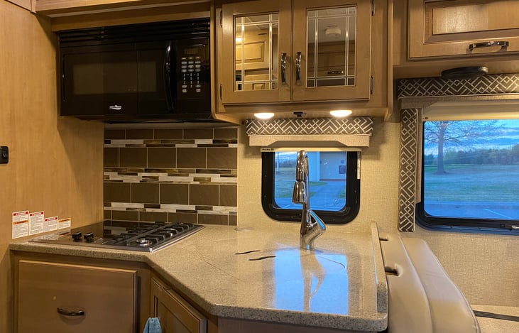 Sink covers allow increased counterspace while preparing meals, and gas/induction cooking allows for flexibility. In addition, convection microwave provides reheating and baking capacity.