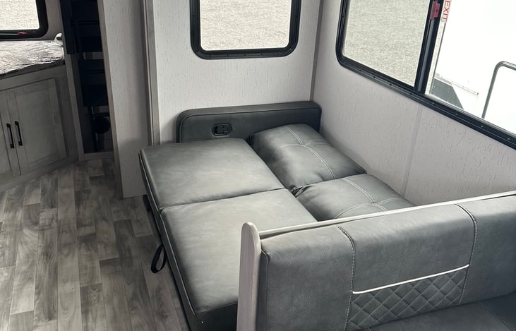 Jackknife sofa folds out for additional sleeping room.