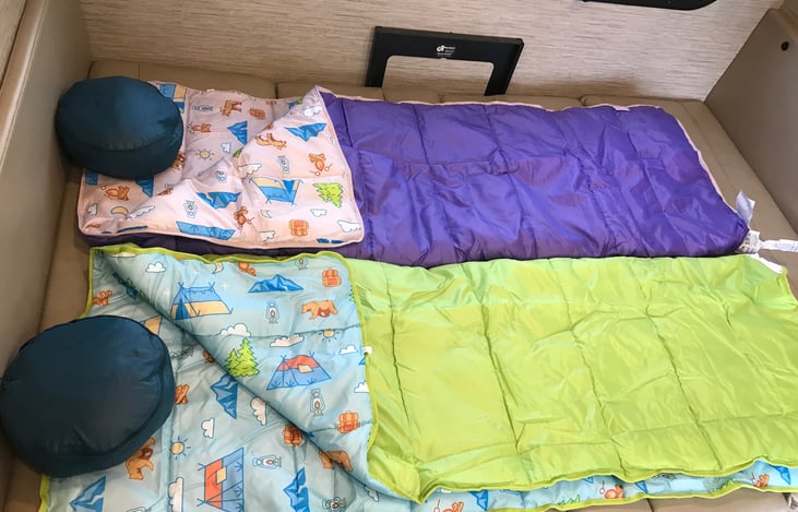 Includes child camping blankets. Dinette seats have seat belts for 2.