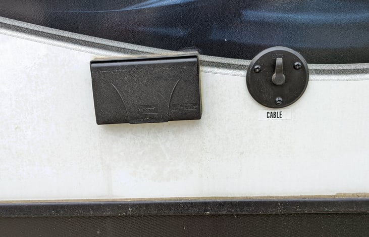 External Outlet and Cable Output Port (Right Side)