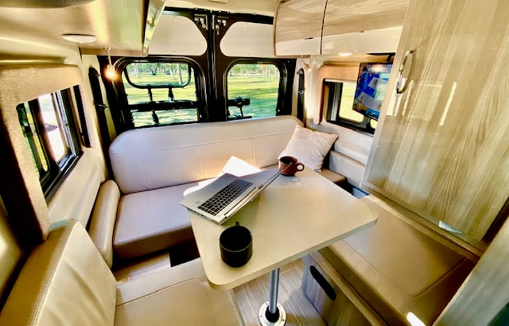 Pop in the included rear lounge table to eat or get some work done on the road, although I wouldn't recommend bringing your laptop.  Relax instead!