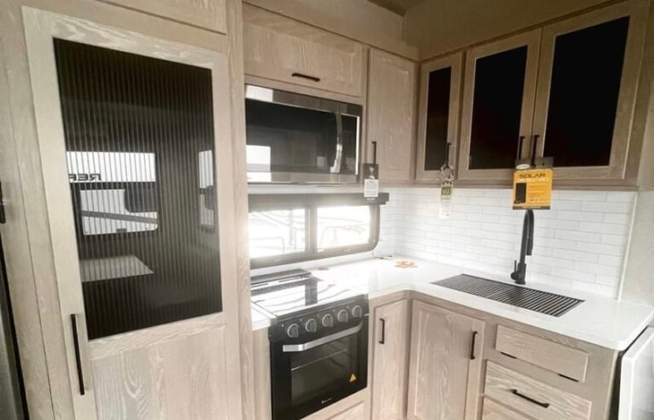 Full kitchenette to prepare your meals. Sink, Refrigerator, Stove and Oven, and Microwave. TONS of storage space and pantry available.

Comes equipped with plates, utensils, and cleaning supplies.