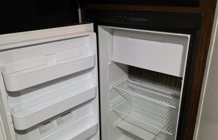 Built-in refrigerator and microwave.