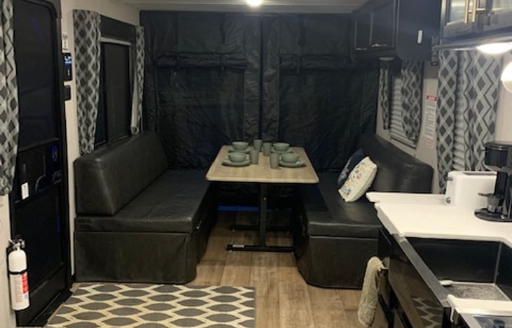 Seating for 4-6 people. Table converts to a Queen sleeper