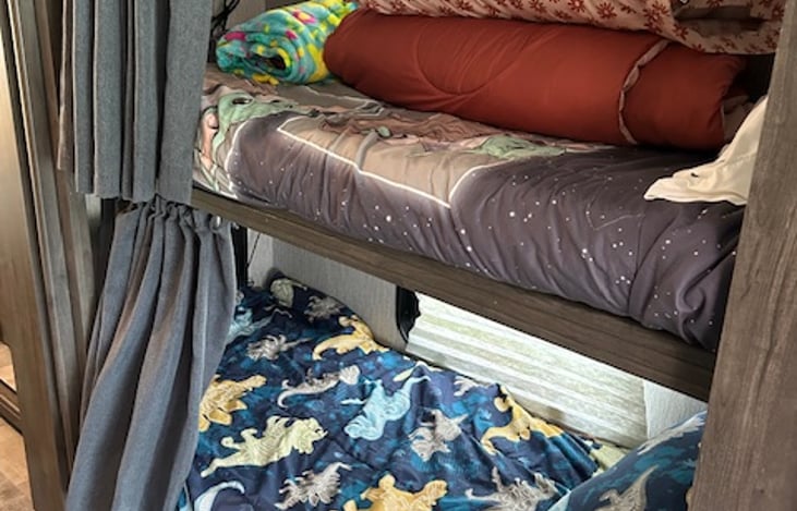 Hallway twin bunks, extra bedding for overhead bunk in the cab.
*Each bunk has there own TV with a firestick and own set of remotes