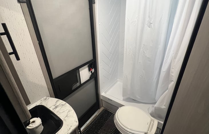 Bathroom has exterior door for easy access for clean up after a fun day at the lake!