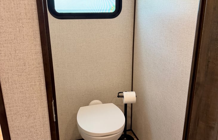 Residential Glass Shower: Extra-large walk-in shower design featuring a premium flip-up seat and a separate private toilet room.