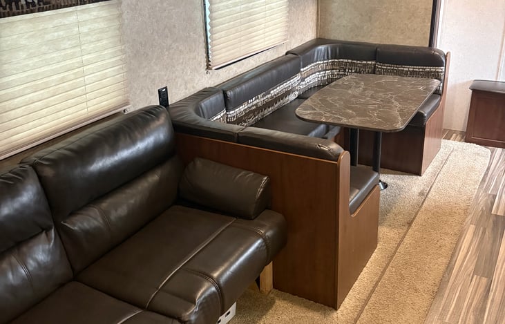 U-shaped dinette with storage underneath seats