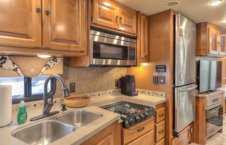 2 burner stove, microwave and convection oven.