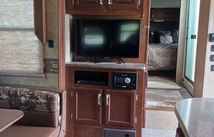 TV with stereo, sound inside and out.