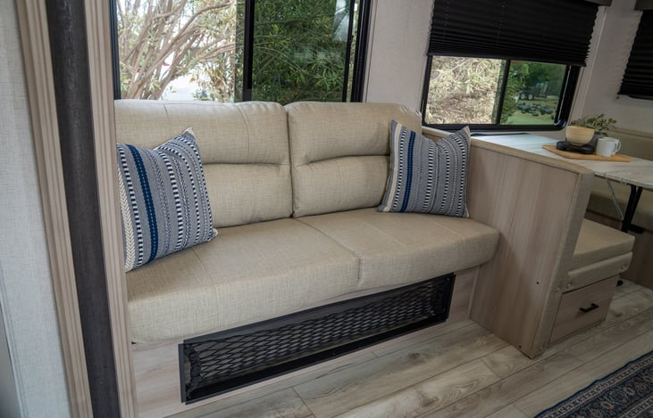 Cargo net with under sofa storage