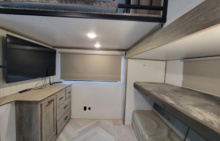 Second bedroom includes pull out couch that becomes a queen size bed. A single bunk and a loft.