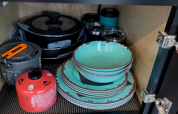 Fully stocked dishes, pots/pans, cups, and Flashboil stove.