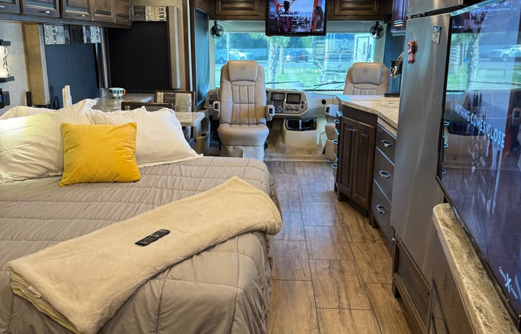 couch converted to a queen inflatable bed