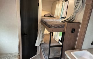 Cozy Home on Wheels: Lightweight Travel Trailer