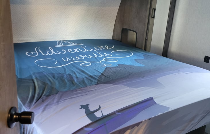 Master bedroom. Storage overhead and below the bed. Closets on both sides of the bed. Additional closet in another picture