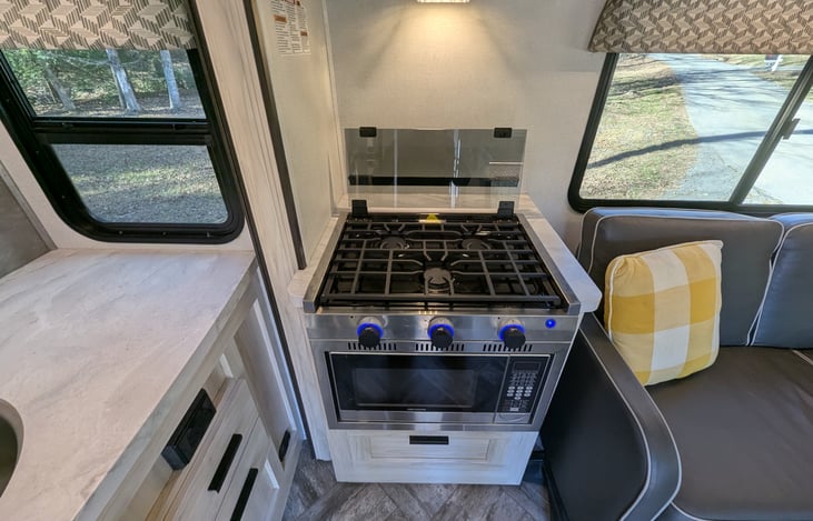 Spacious, bright & modern interior. Well-stocked kitchen with stove-top and convection microwave. Comfy couch and dinette both convert to beds. Large overhead bunk with swing-out TV for entertainment.