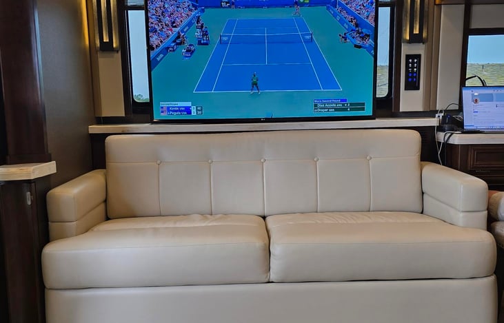 Second sofa is also a futon bed.  The main TV is on a "televator" that can be up when on or down when off.