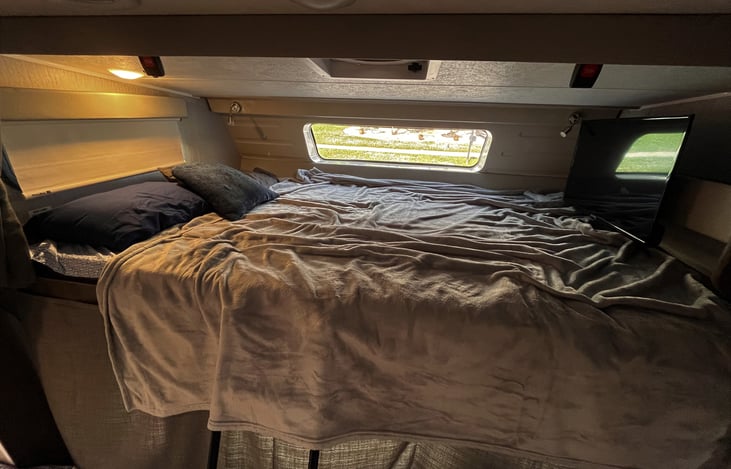 Oversize bunk over cab with TV