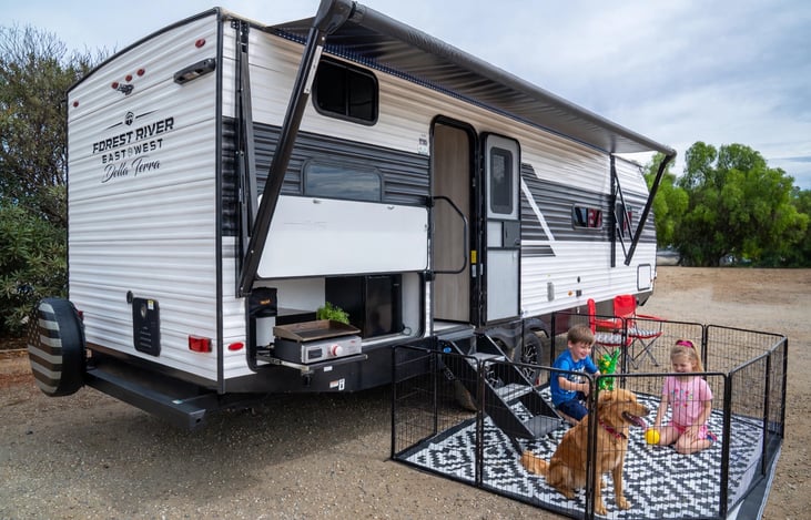 outdoor rug, pet/child gate, and camping chairs included!