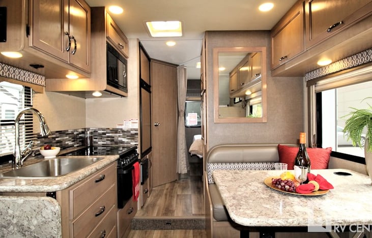 Beautiful interior with a large window to look out your scenic campsite!